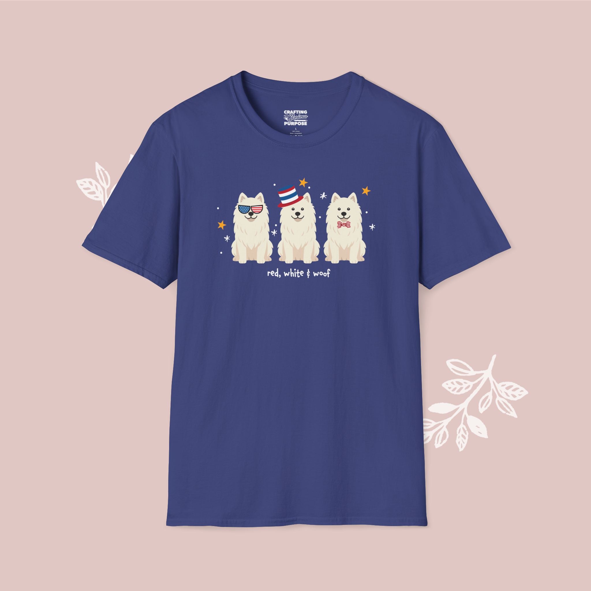 Blue t-shirt with dog illustrations on a pink background