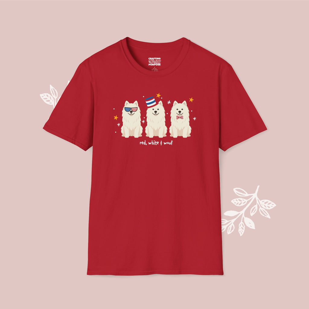 Red t-shirt with a graphic of three dogs and text on a pink background