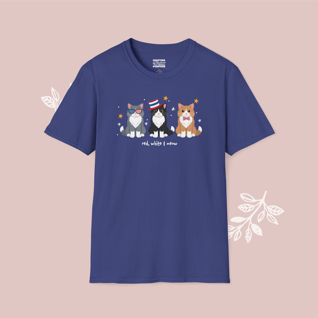 Blue t-shirt with cartoon cats design on a pink background