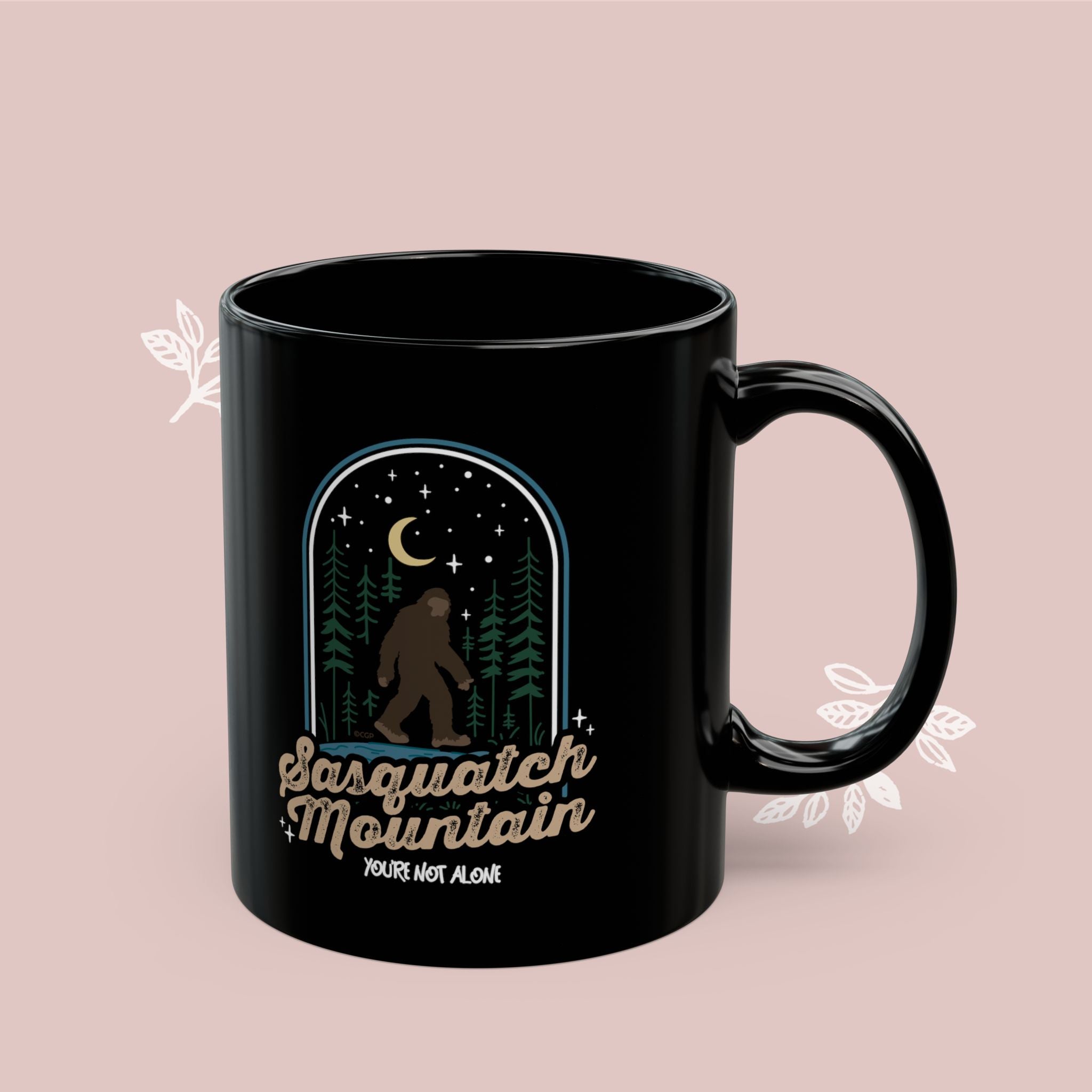 Sasquatch Mountain Black Mug — 'You're Not Alone' Retro Design
