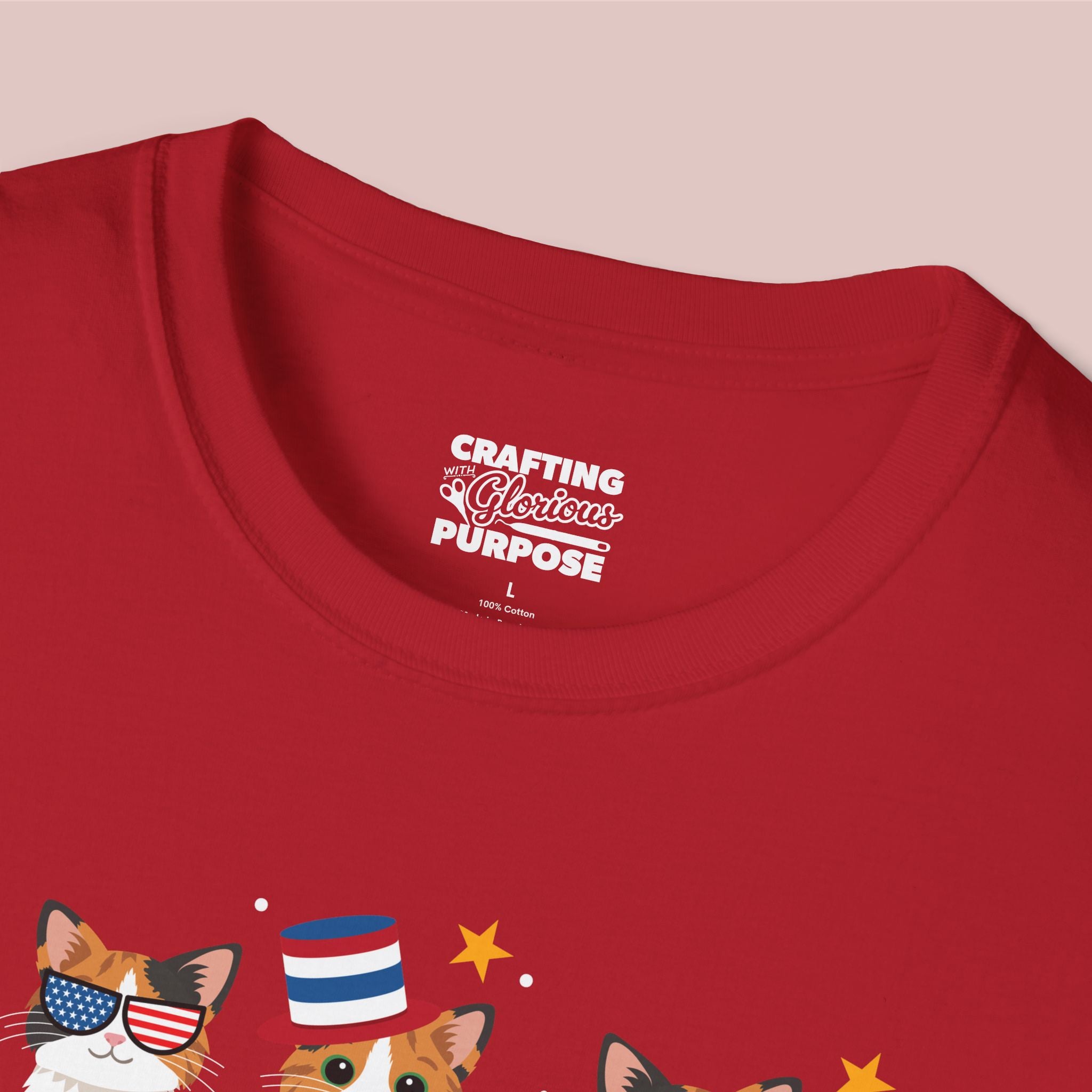 Red t-shirt with cat graphic and 'Crafting a Glorious Purpose' text on a pink background