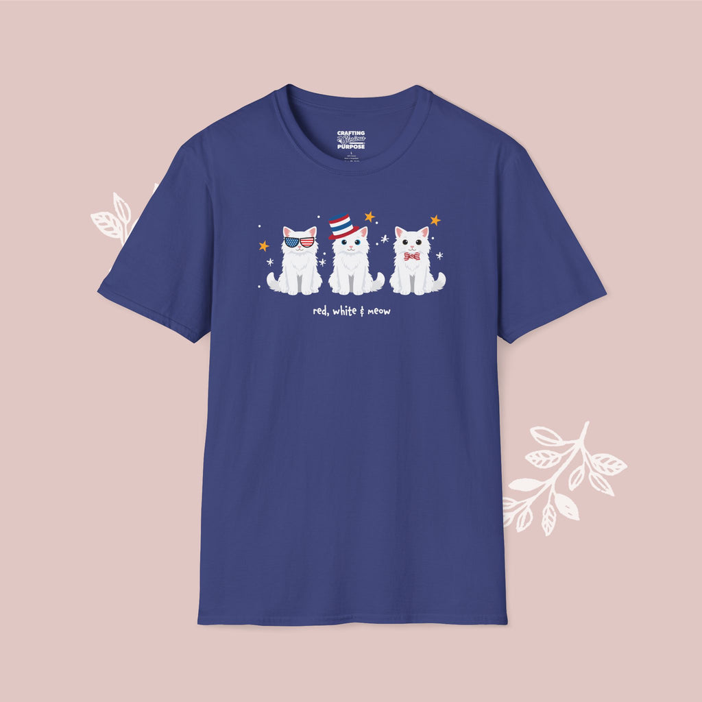 Blue t-shirt with cartoon cats design on a pink background