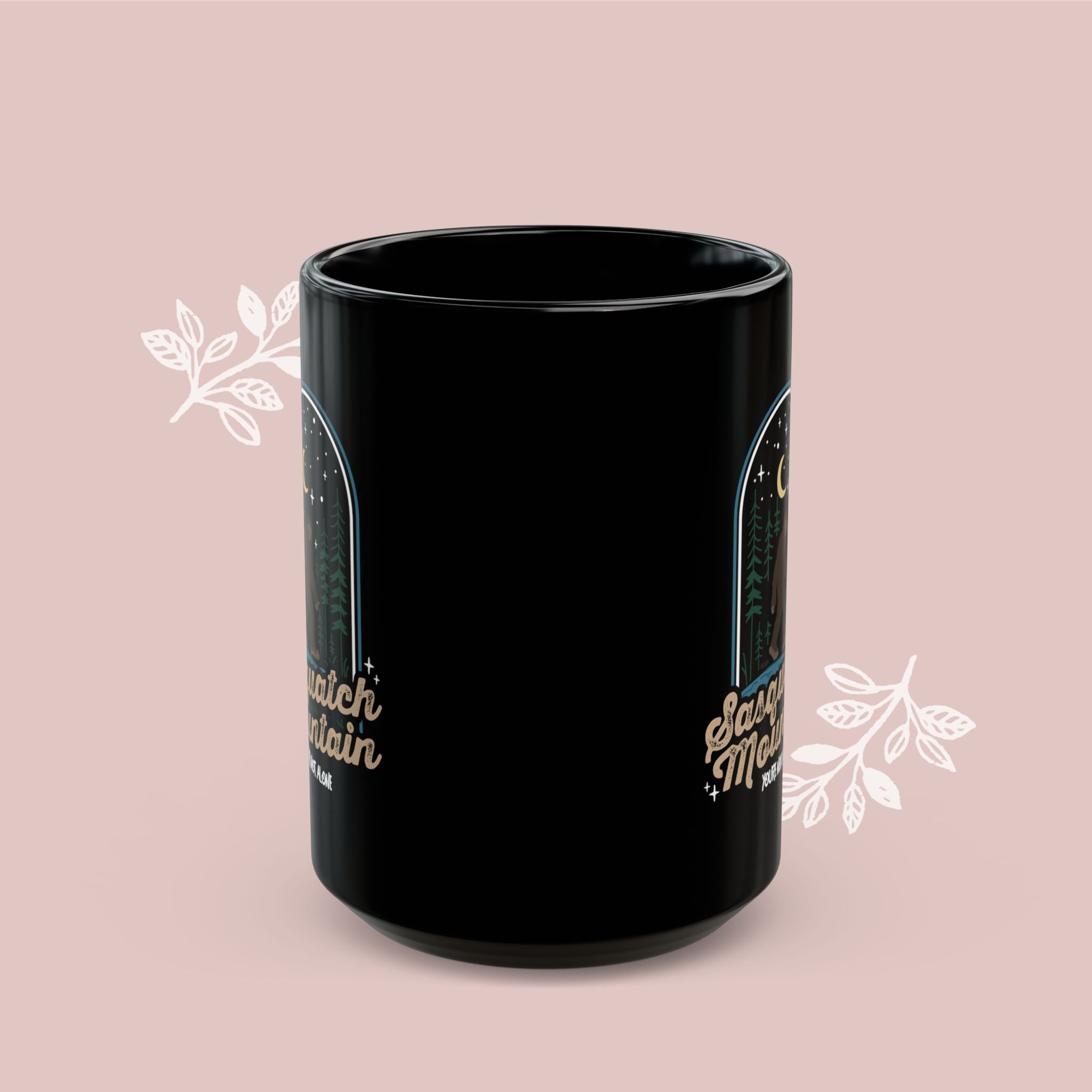 Sasquatch Mountain Black Mug — 'You're Not Alone' Retro Design
