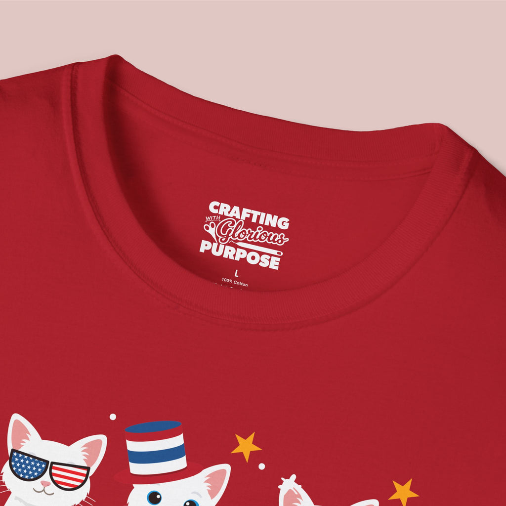 Red t-shirt with patriotic cat design and 'Crafting a Glorious Purpose' text on a pink background