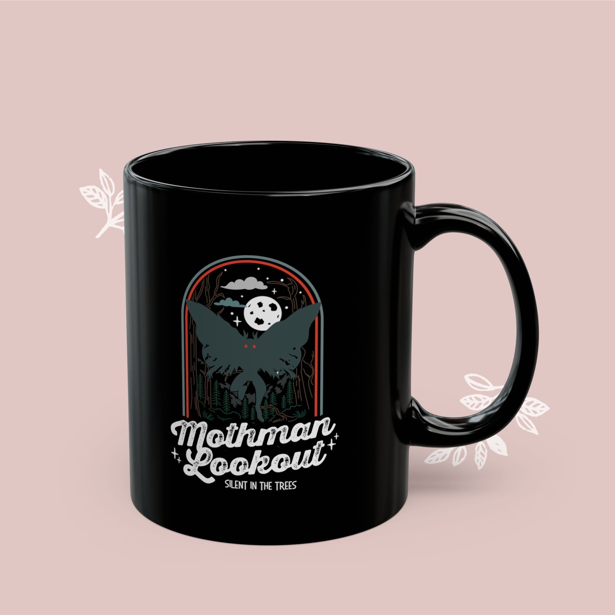 Black mug with white text on a white background