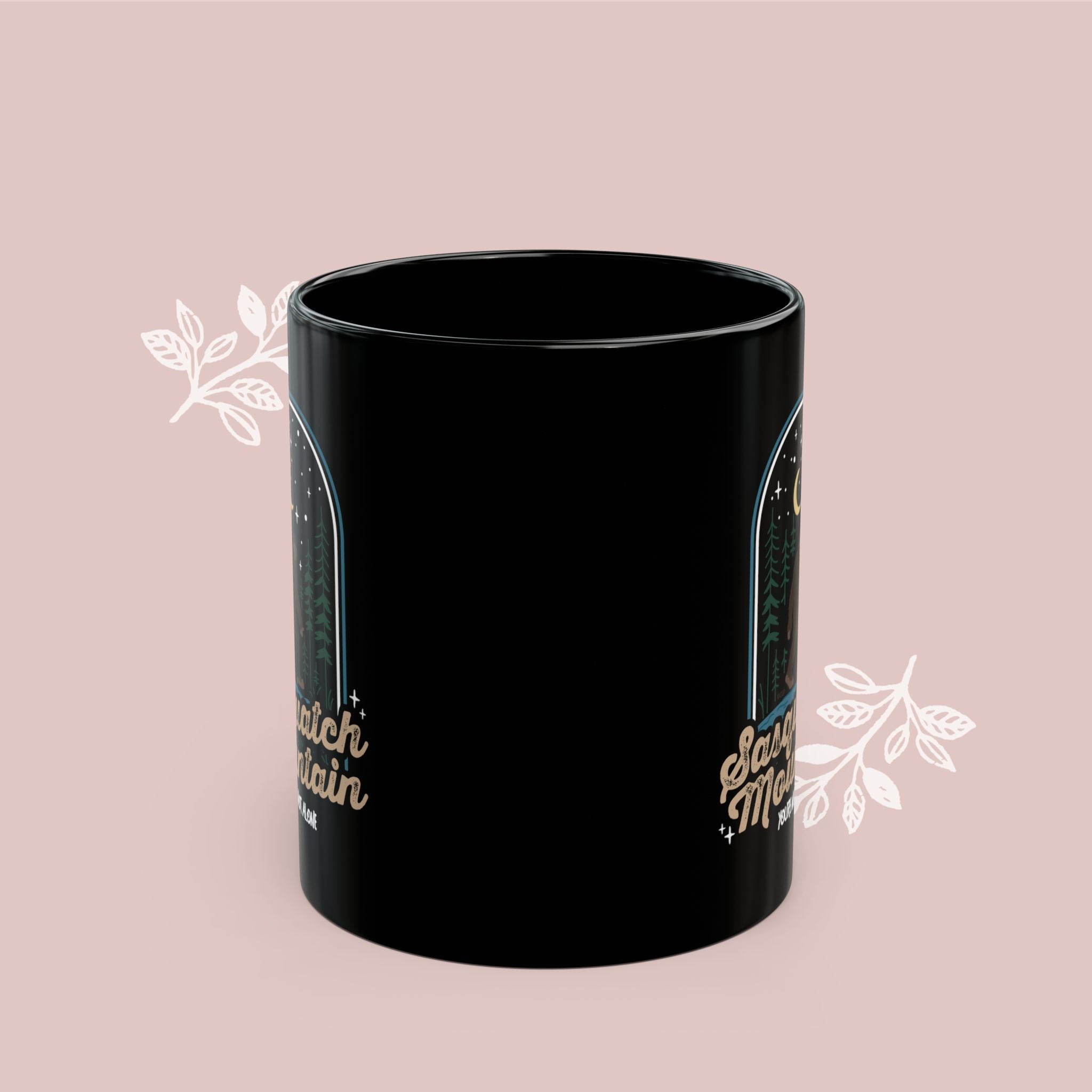 Sasquatch Mountain Black Mug — 'You're Not Alone' Retro Design