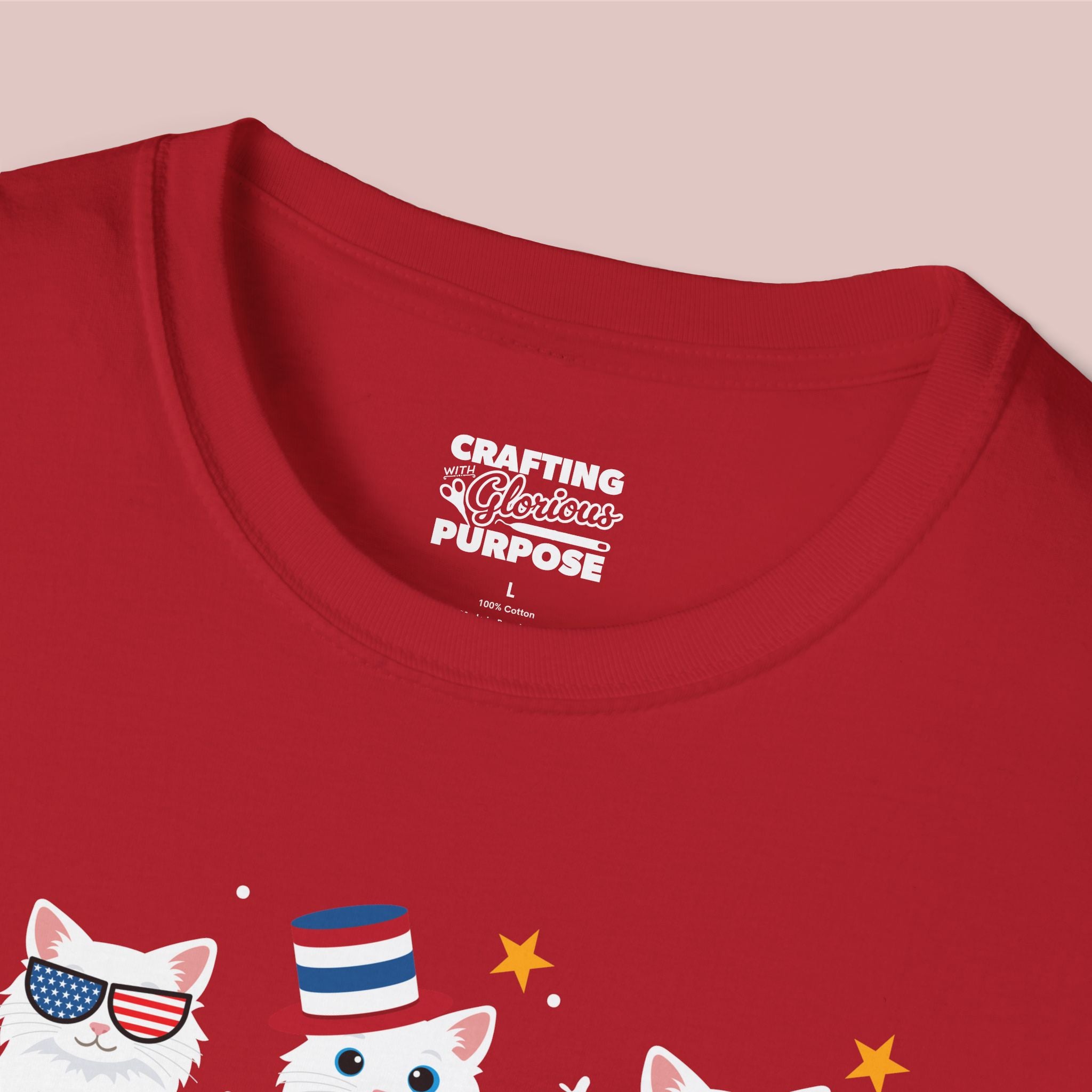 Red t-shirt with cat graphics and 'Crafting a Glorious Purpose' text on a pink background