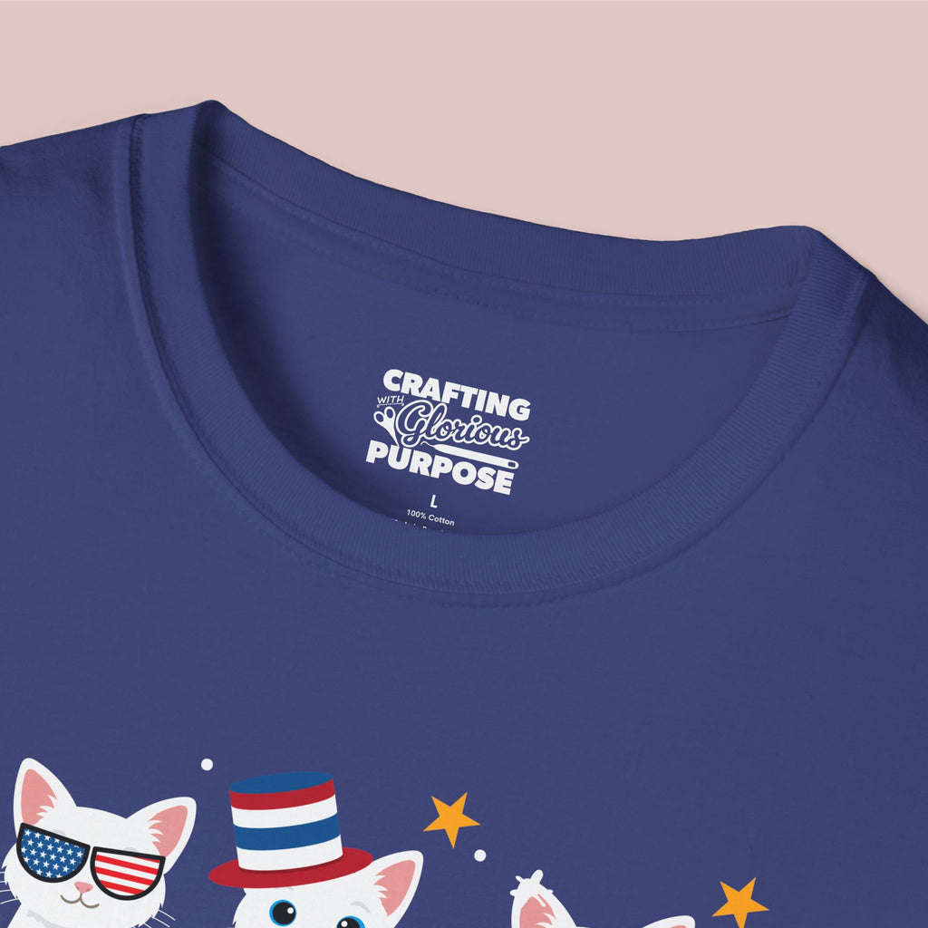 Navy blue t-shirt with cat graphics and 'Crafting a Glorious Purpose' text on a pink background