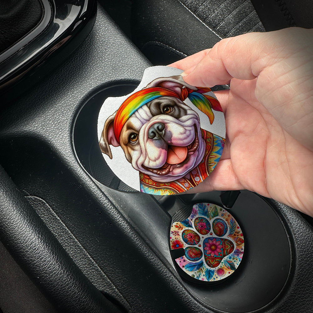 Hand placing a colorful car coaster with a dog design into a car cup holder.