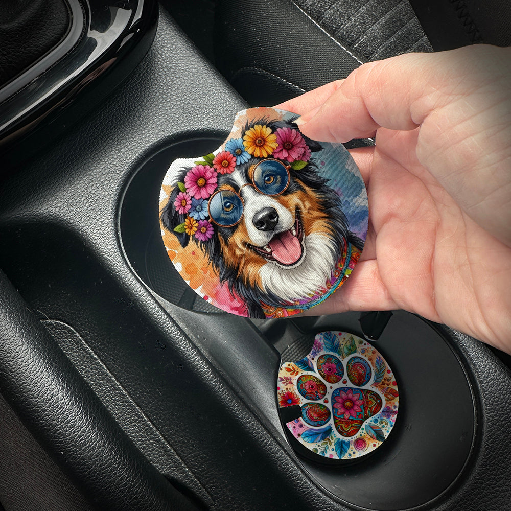 Hand placing a colorful car coaster with a dog design into a car cup holder.
