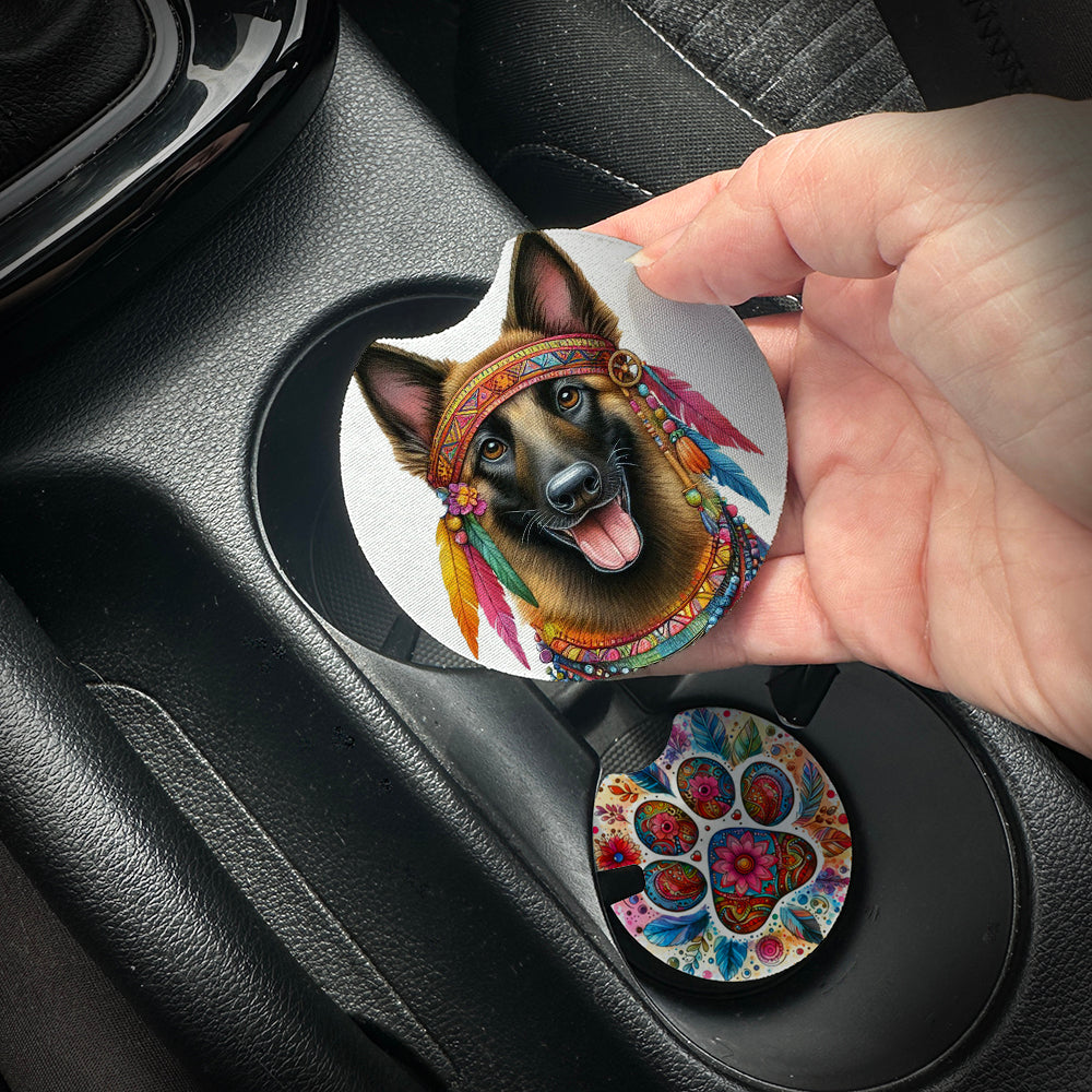Hand placing a colorful car coaster with a dog design into a car cup holder.