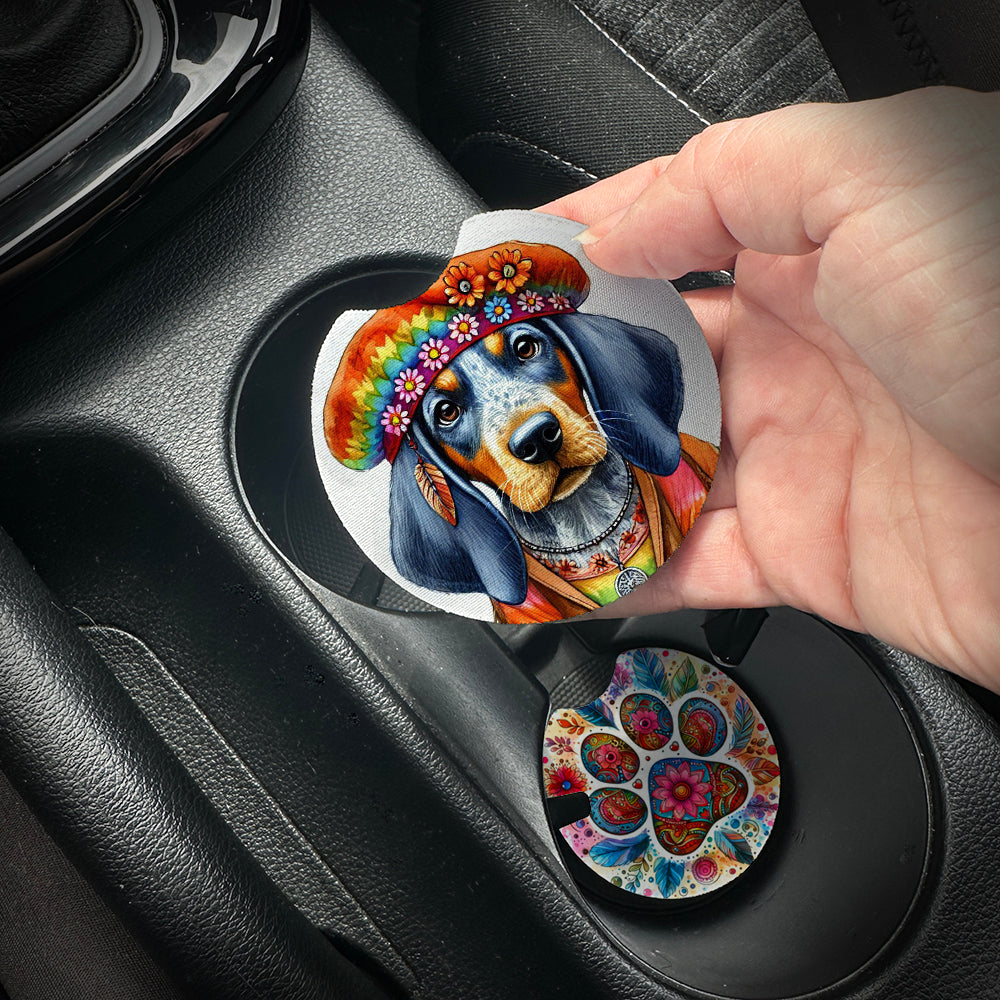 Hand placing a colorful car coaster with a dog design into a car cup holder.