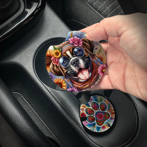 Hand placing a colorful car coaster with a dog design into a car cup holder.