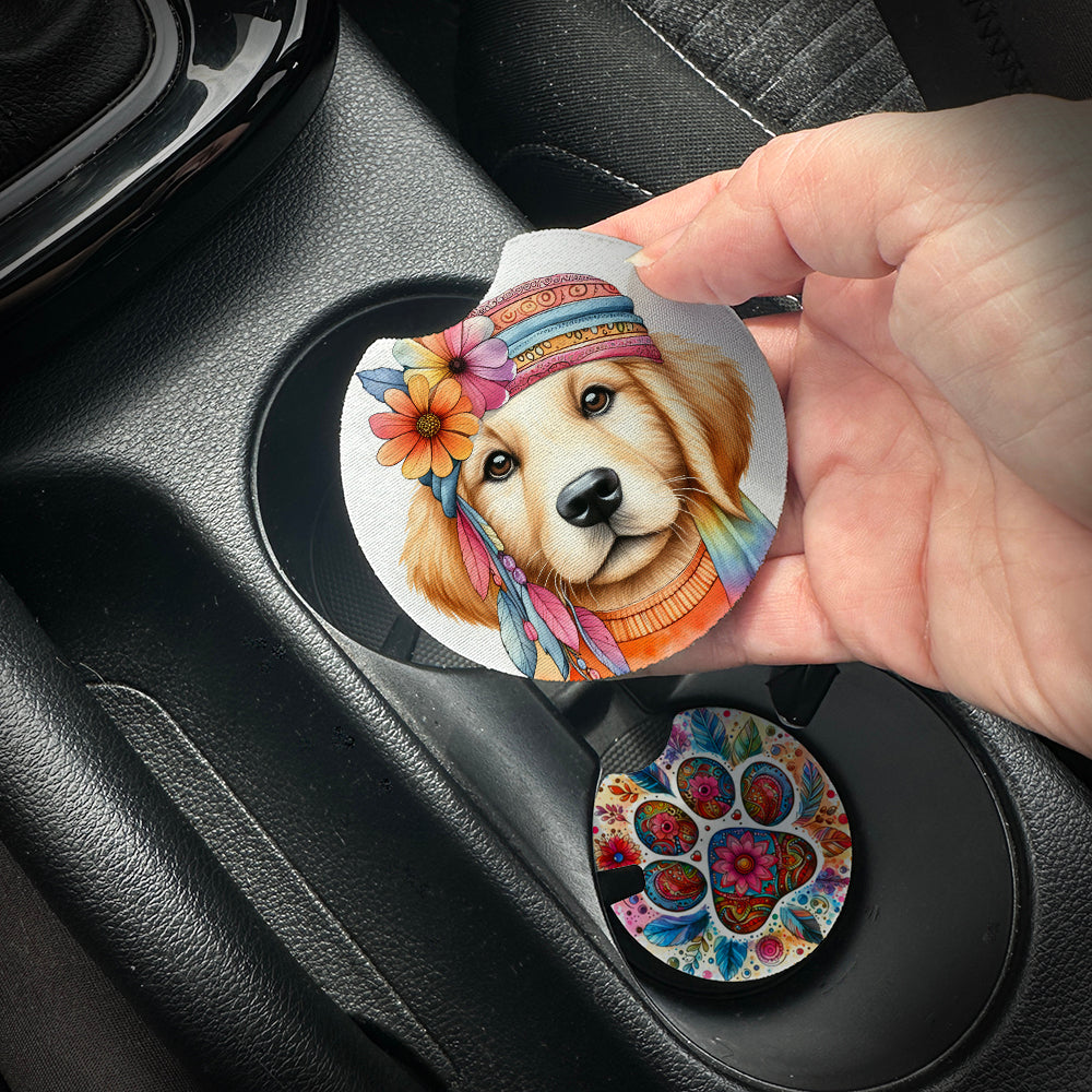 Hand placing a colorful car coaster with a dog design into a car cup holder.