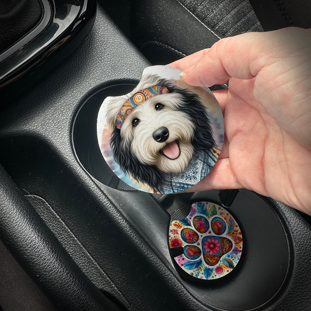 Hand placing a colorful car coaster with a dog design into a car cup holder.