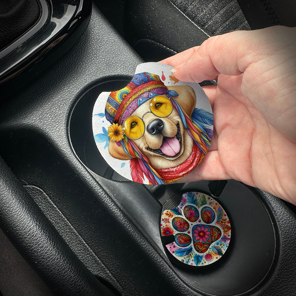 Hand placing a colorful car coaster with a dog design into a car cup holder.