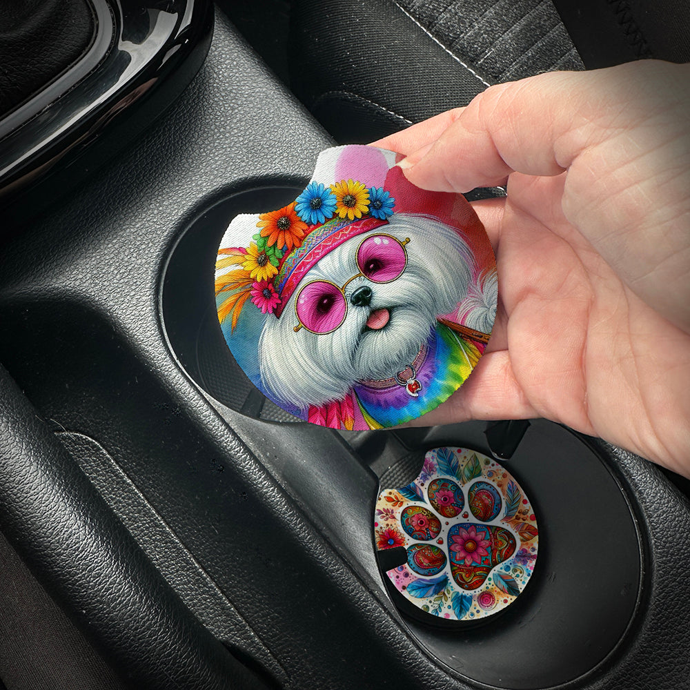 Hand placing a colorful car coaster with a dog design into a car cup holder.