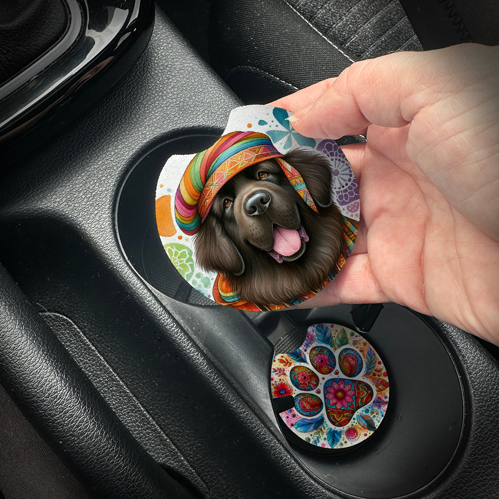 Hand placing a colorful car coaster with a dog design into a car cup holder.
