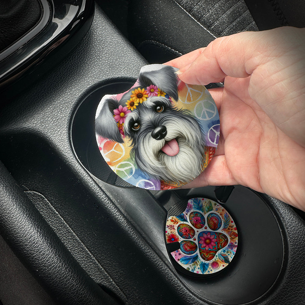Hand placing a colorful car coaster with a dog design into a car cup holder.