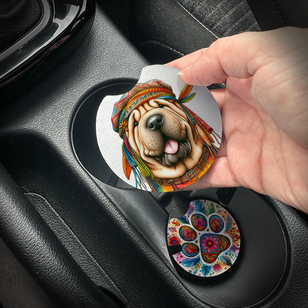 Hand placing a colorful car coaster with a dog design into a car cup holder.
