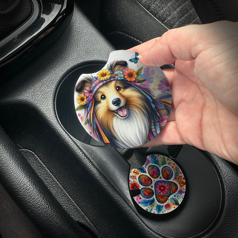 Hand placing a colorful car coaster with a dog design into a car cup holder.
