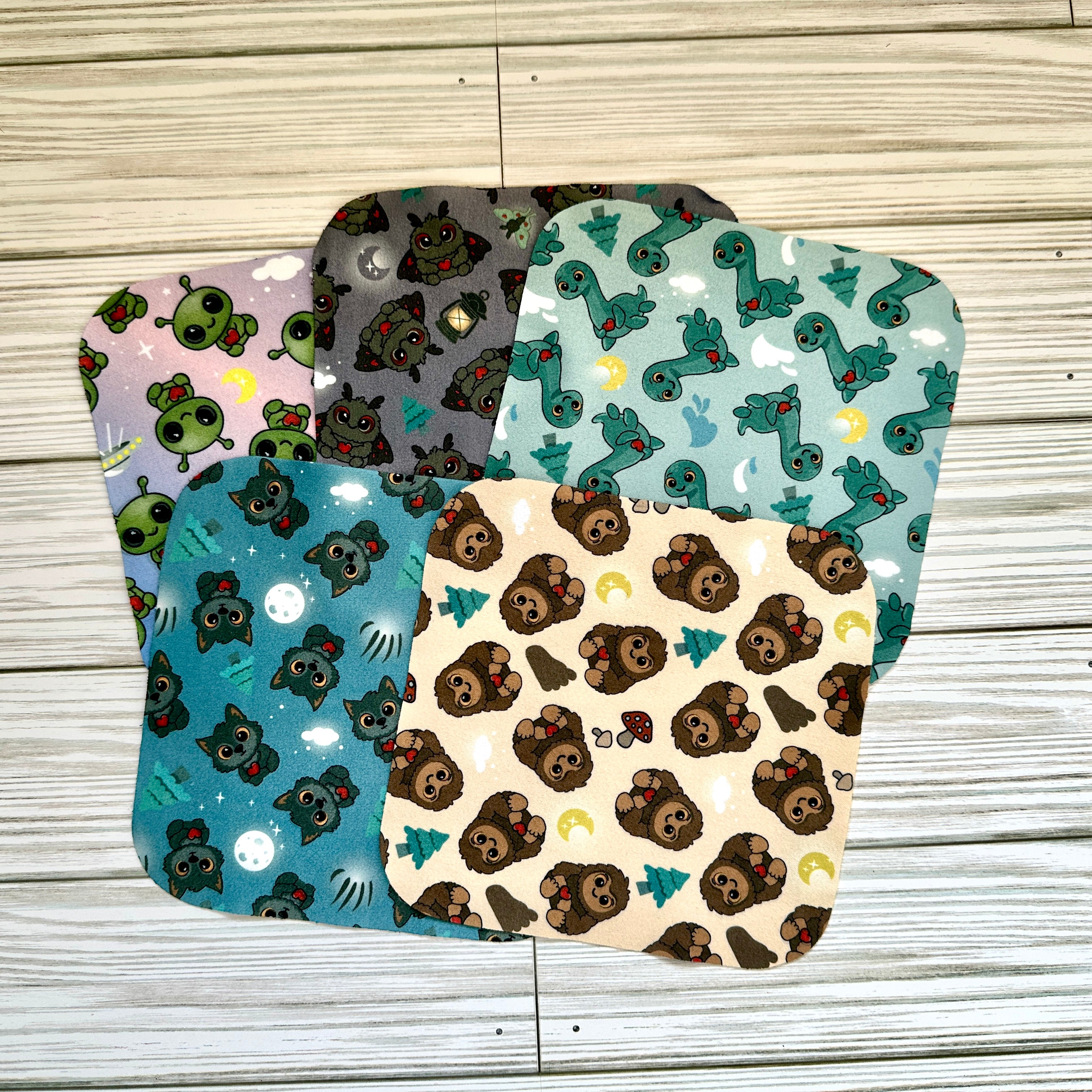 Group image of all cryptid cleaning cloths