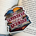 Sticker with 'My weekend is fully booked' text on top of an open book