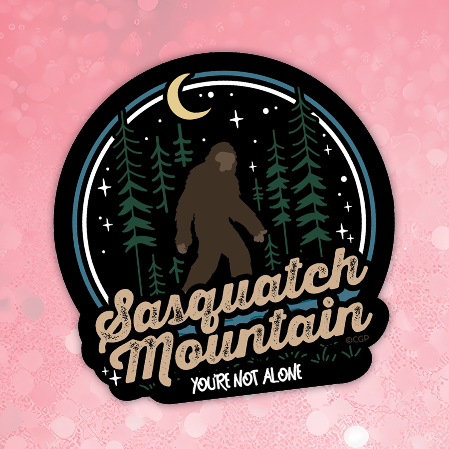 Sasquatch Mountain sticker with a silhouette of a bigfoot, trees, and moon on a pink background