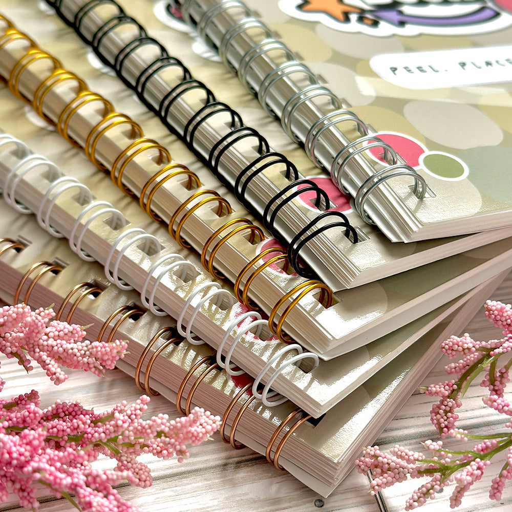 Color variations of coils for spine, gold, rose gold, white, black and silver.