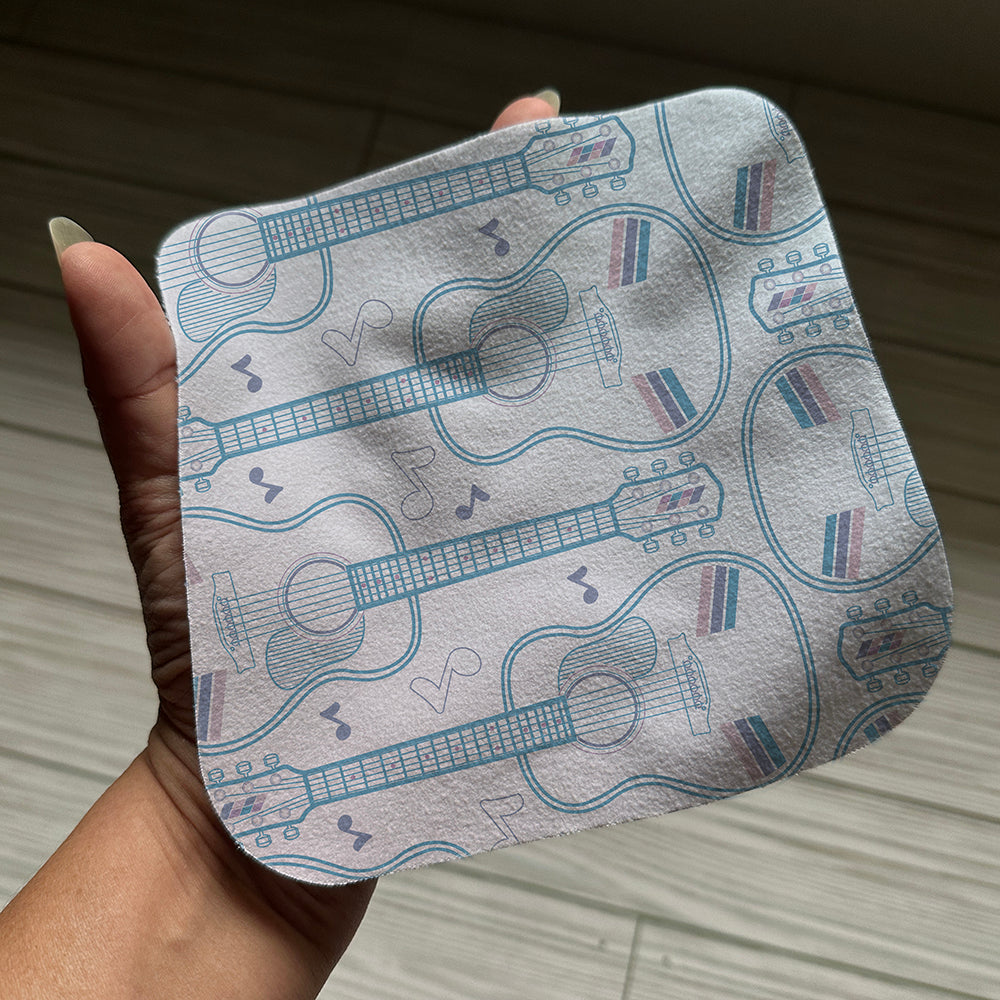 Acoustic guitar pattern on a screen cloth in hand