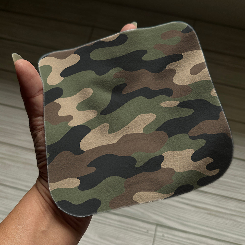 Camouflage pattern on a screen cloth in hand