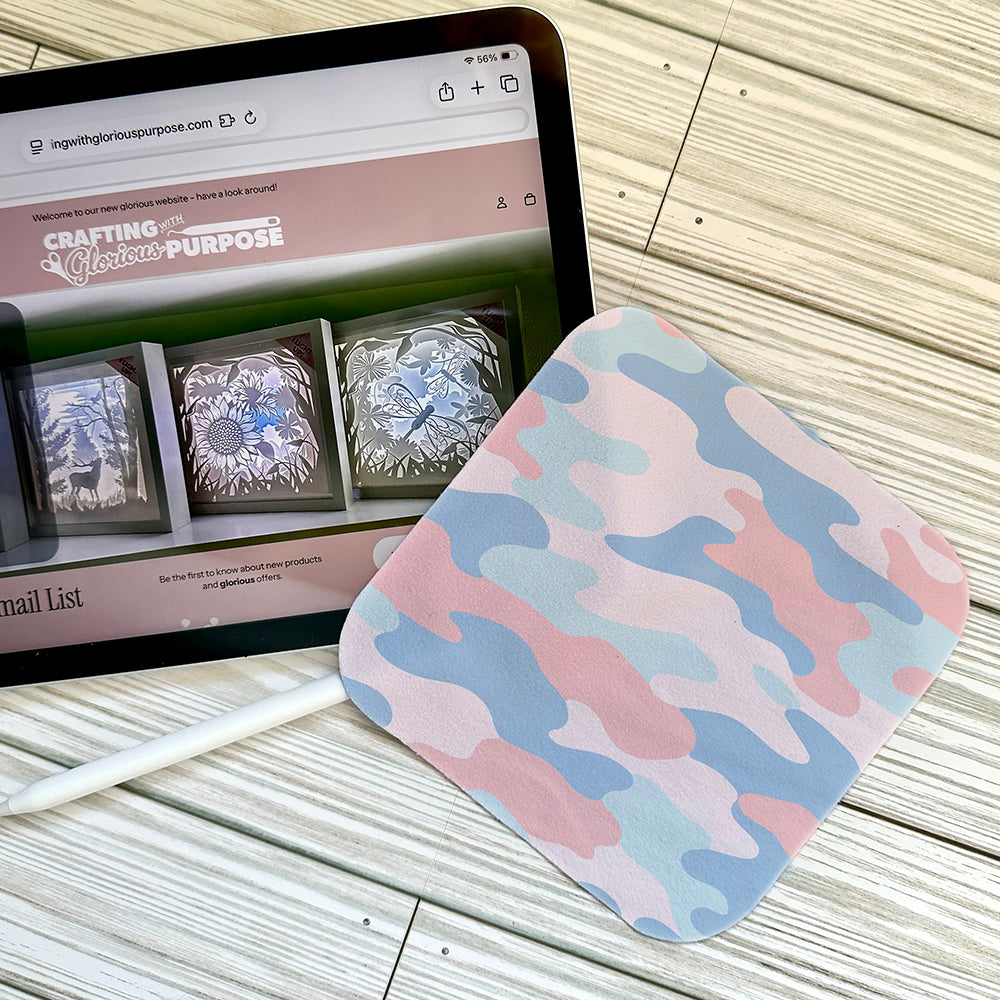 Pink Camouflage pattern on a screen cloth with an iPad
