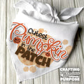 White bandana with 'Cutest Pumpkin in the Patch' text and a white ribbon on a wooden surface, featuring the brand 'Crafting with Glorious Purpose'.