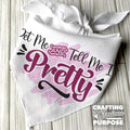 White bandana with decorative text and floral design on a wooden surface, featuring the brand 'Crafting with Glorious Purpose'.