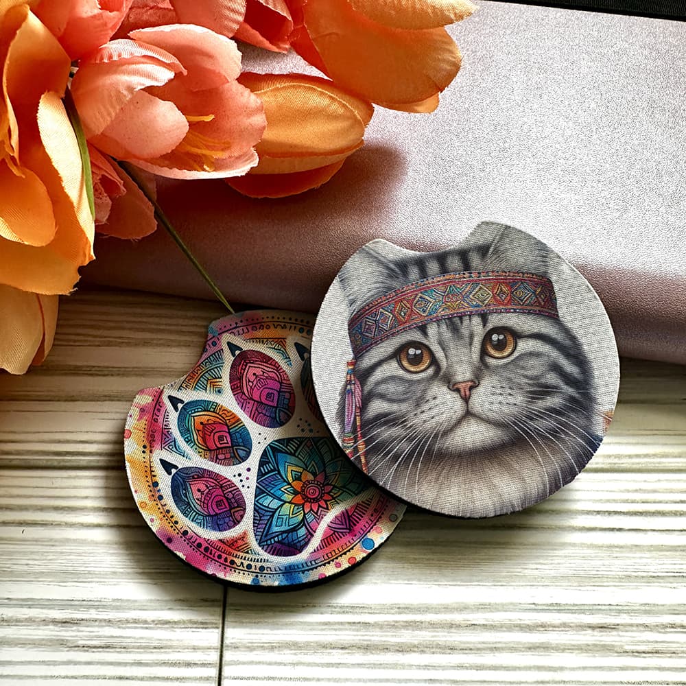 Colorful cat-themed coasters with floral background