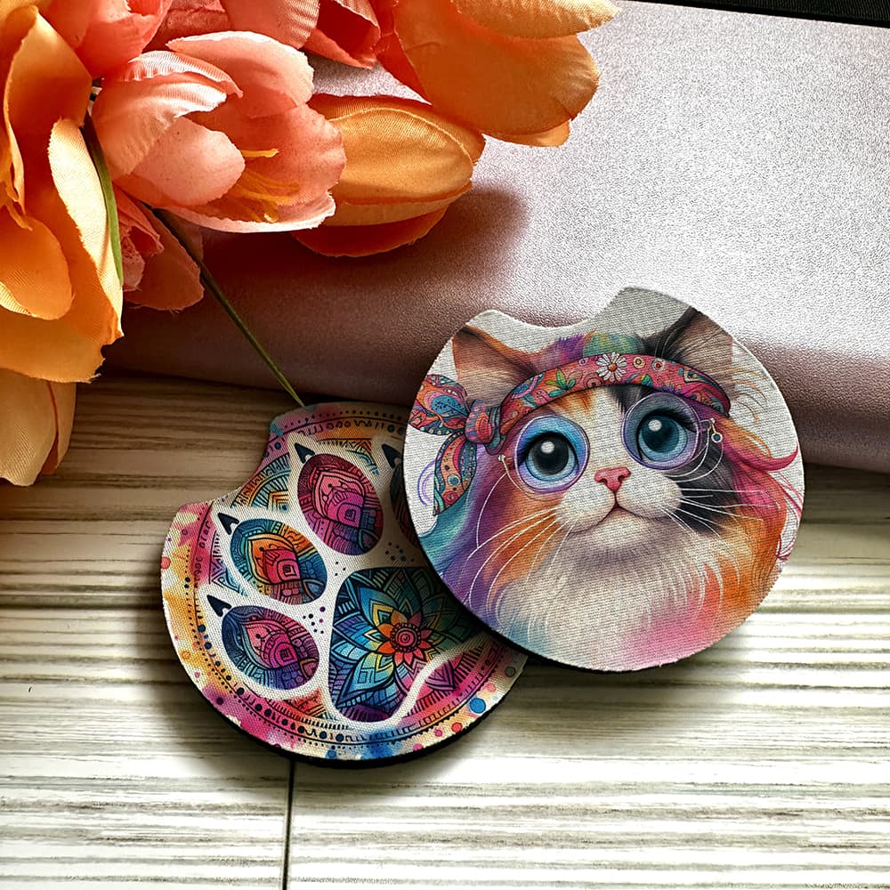 Colorful cat-themed coasters with floral background