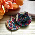 Colorful cat-themed coasters with floral background