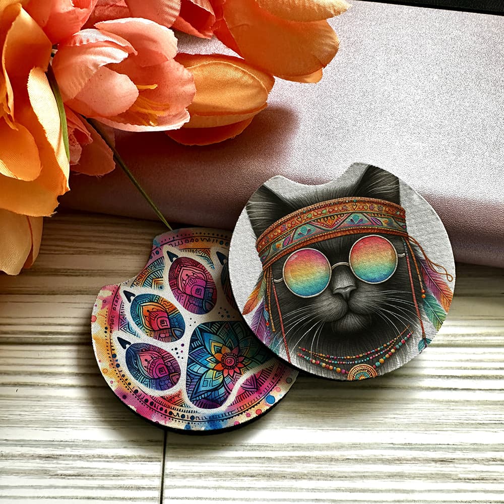 Colorful cat-themed coasters with floral background