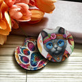 Colorful cat-themed coasters with floral background