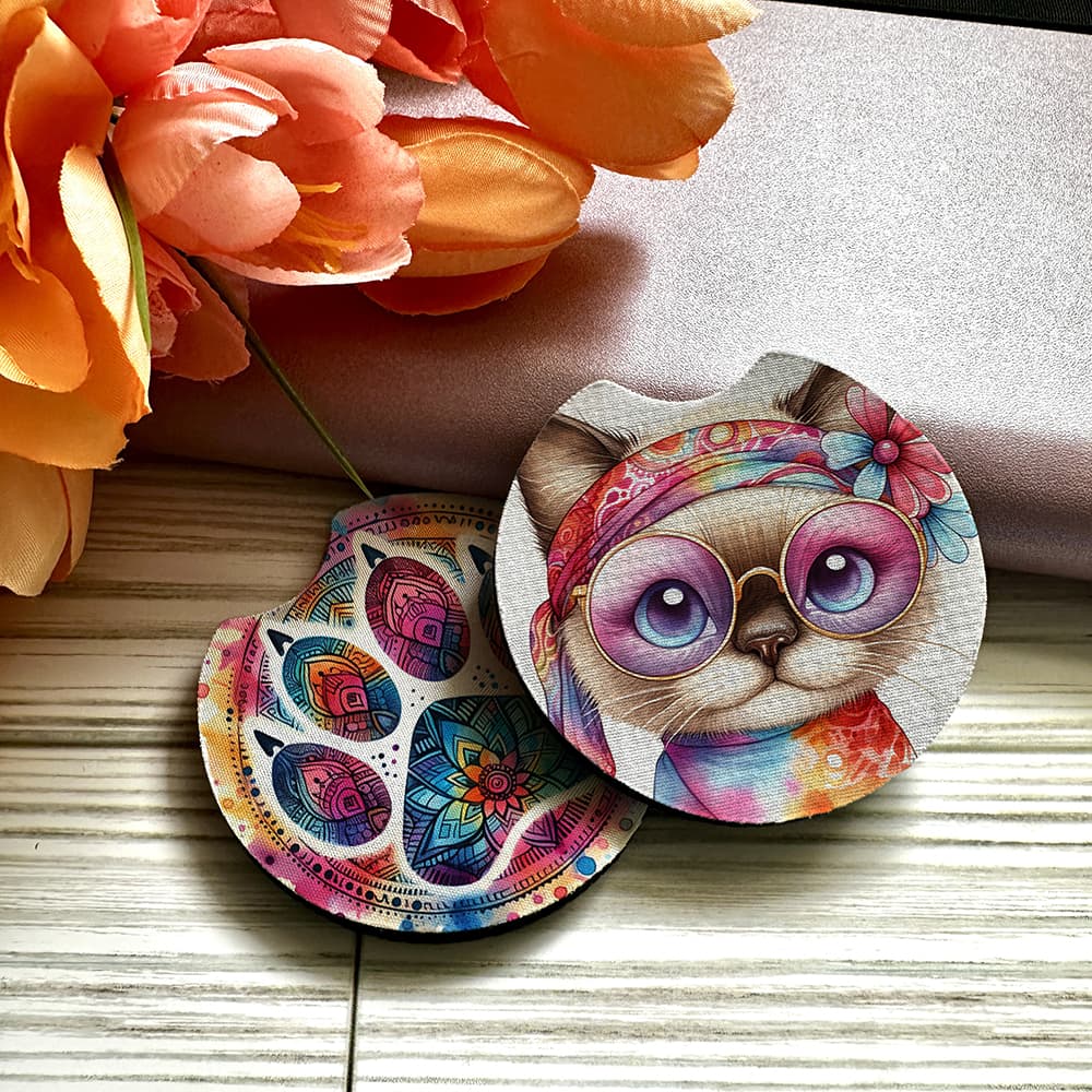 Colorful cat-themed coasters with floral background