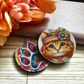 Colorful cat-themed coasters with floral background