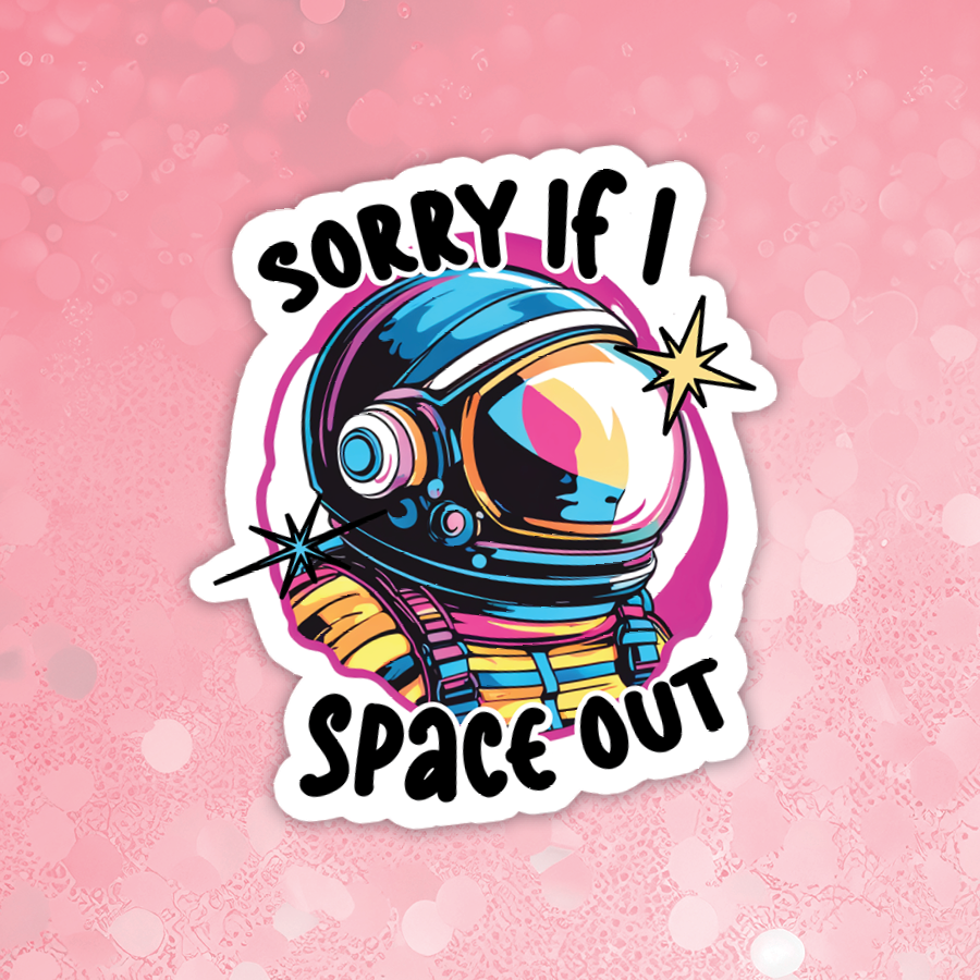 Colorful sticker with an astronaut helmet and text 'Sorry if I Space Out' on a pink background