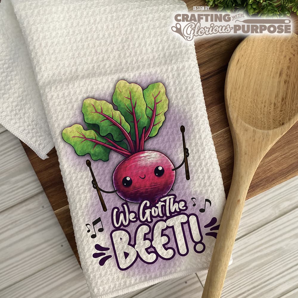 Kawaii beet design on a kitchen towel with a wooden spoon