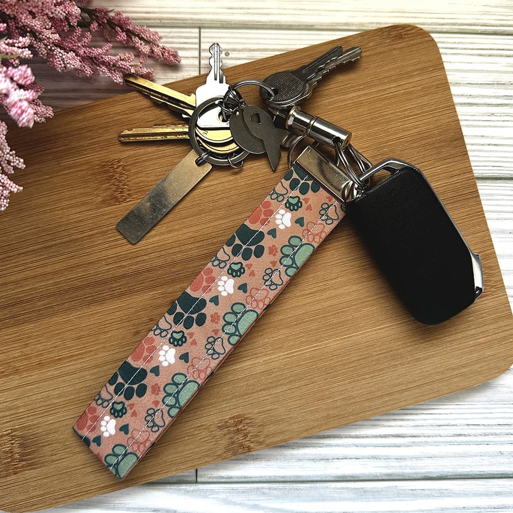 Handmade Wristlet Keychain - Teal and Orange Paw Prints